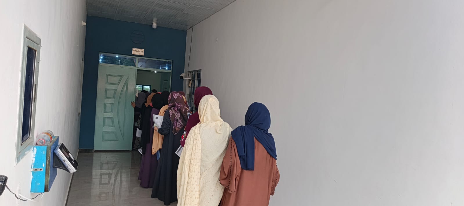 Students at the office counter